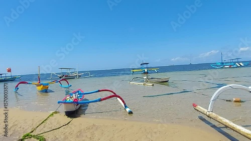 Beach Lifestyle and Traditional Boats in Sanur, Bali