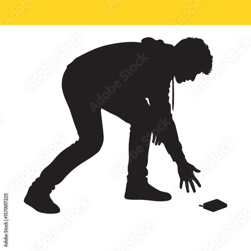 Silhouette of a Person Bending Down to Pick Up a Dropped Item