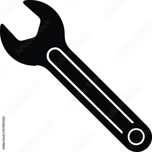 Spanner Silhouette: A minimalist image featuring a single spanner against a stark backdrop, this image is a potent symbol of tools, fix, and mechanical.
