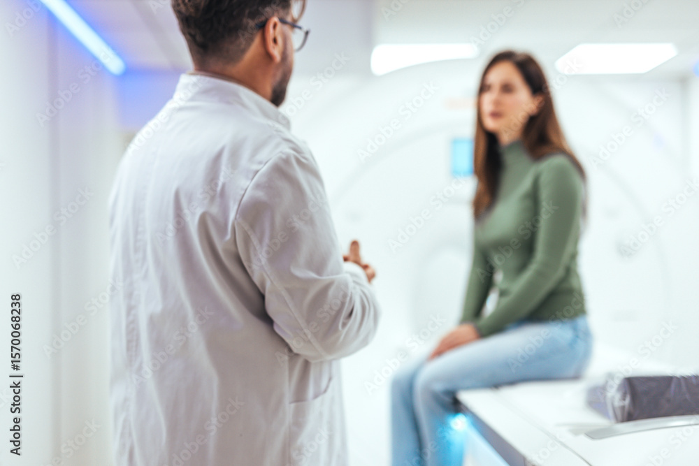 Doctor Discussing a Procedure With a Patient in a Medical Facility Doctor Discussing a Procedure With a Patient in a Medical Facility