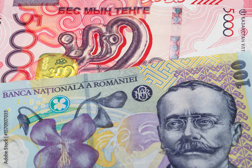 Wallpaper Mural 5000 Kazakhstani tenge and 100 Romanian leu banknotes. International trade concept Torontodigital.ca