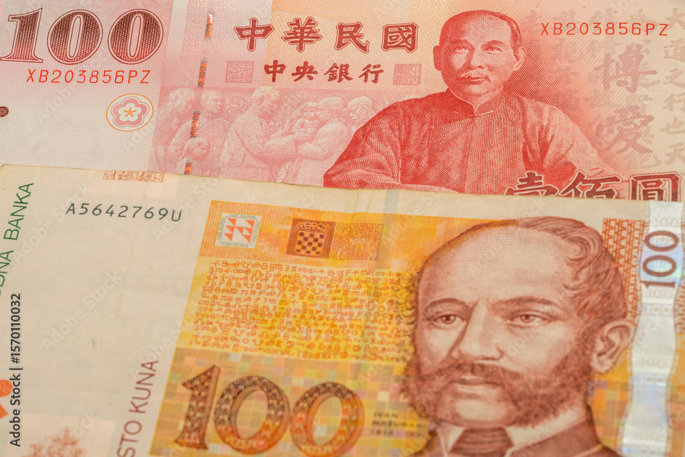 Fototapeta premium 100 New Taiwan dollar and 100 Croatian kuna banknotes. International trade concept