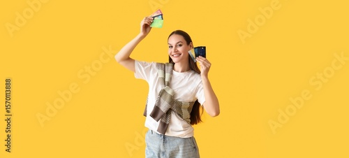 Happy young woman with many...