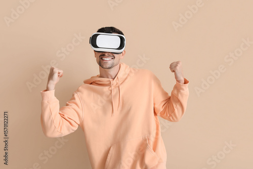 Happy young man in VR glass...