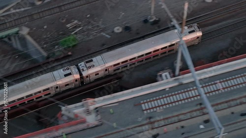 Aerial view of a New Jersey Transit train at dusk