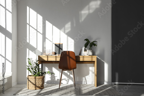 Modern workplace with books...