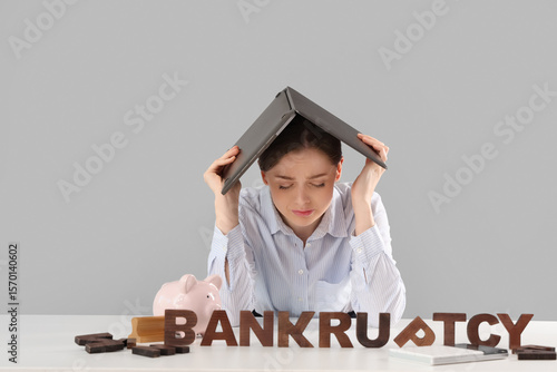 Stressed businesswoman with...