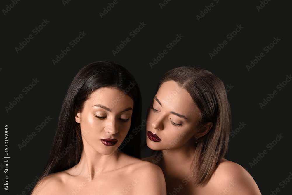 Two different naked young women on black background. Yin Yang concept Two different naked young women on black background. Yin Yang concept