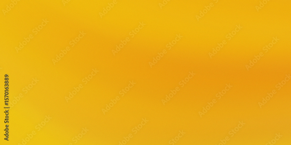 Obraz premium Warm golden yellow gradient with subtle grain texture background
