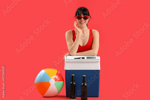 Young woman with portable f...