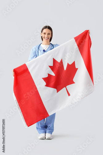 Female doctor with flag of ...