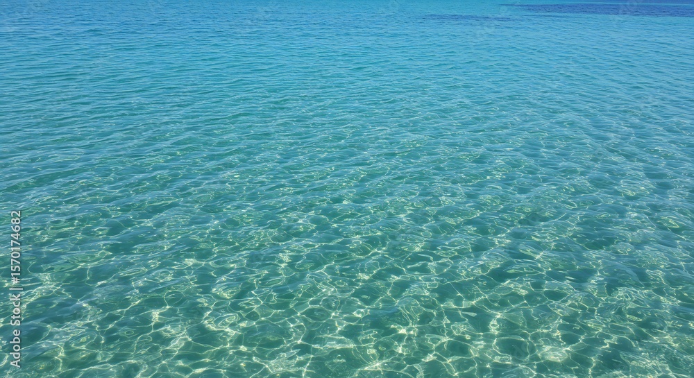 Crystal-clear turquoise water with gentle ripples, sunlight reflections, tranquil mood, serene environment. Crystal-clear turquoise water with gentle ripples, sunlight reflections, tranquil mood, serene environment.