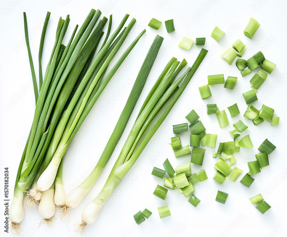 Freshly cut scallions arranged on white background Freshly cut scallions arranged on white background