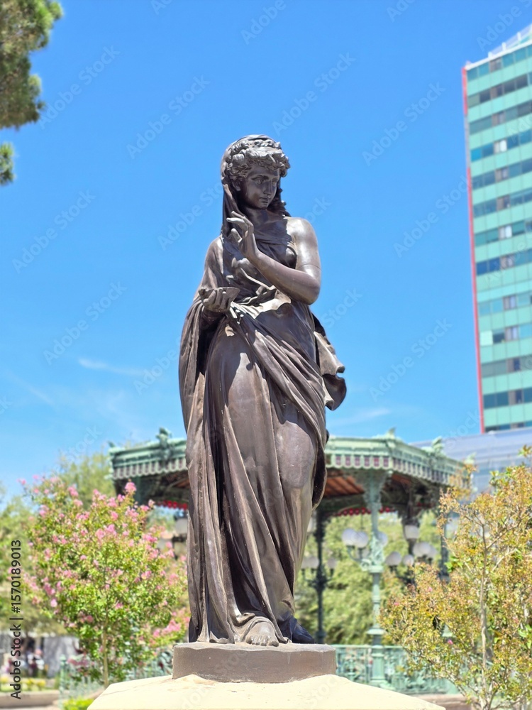 Obraz premium Statue in a public area in Mexico, it represents the summer, as one of four statues that represents the 4 seasons, placed in the 