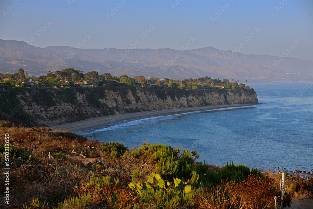 Fototapeta premium Strong waves wash up on the shores of Malibu from Point Dume, just up the Pacific Coast Highway from Los Angeles. 