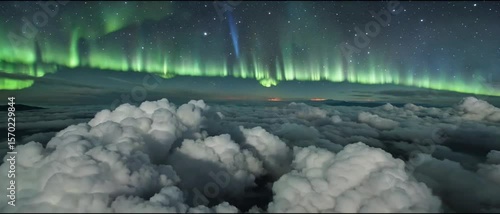 Flying above the clouds with a green aurora borealis and a starry night sky
