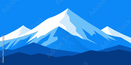 Dramatic snowy mountain peaks pierce the sky, their icy rock faces and glaciers defining a rugged winter landscape