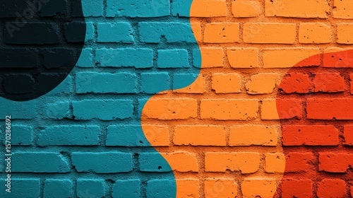 Vibrant brick wall with painted abstract shapes