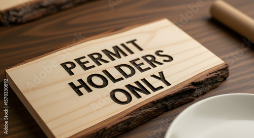 Rustic Wooden Sign For Permit Holders Only Displayed On A Wooden Table