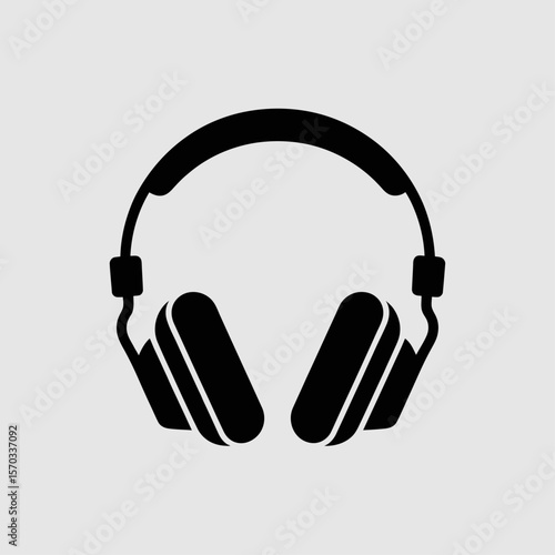 The Silhouette of Sound: A graphic, clean silhouette of a classic headphone, conveying the essential form and function of this iconic device, perfect for music enthusiasts.