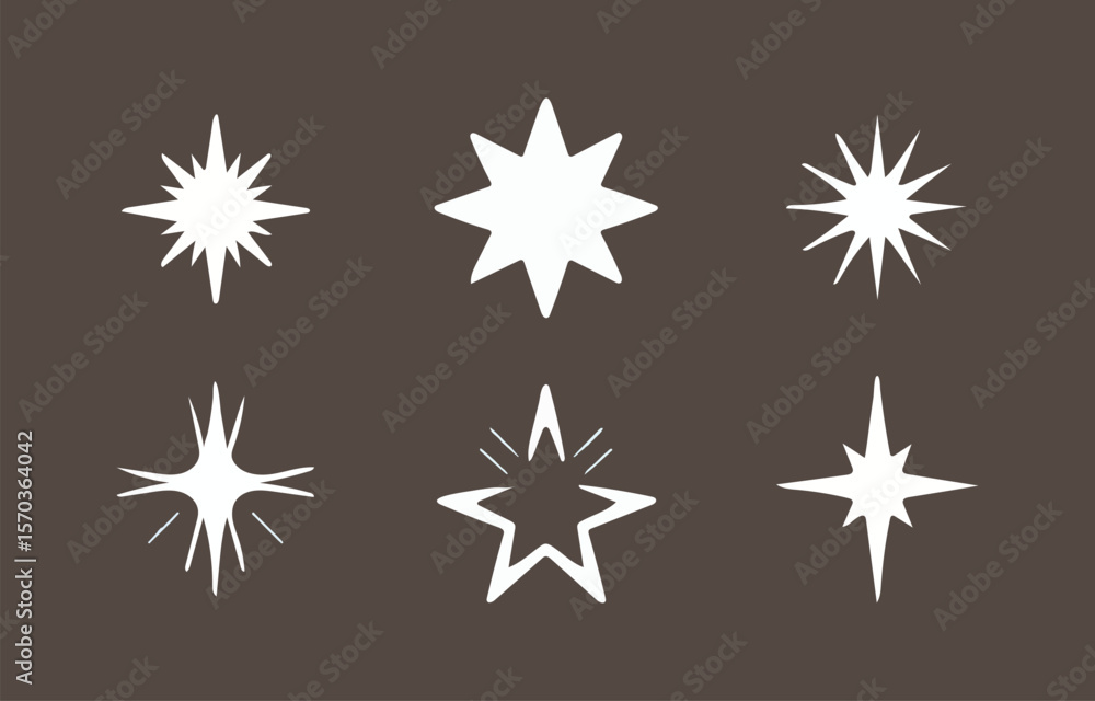 Fototapeta premium A collection of six unique white starburst and sparkle graphic elements with sharp points and glowing effects displayed against a dark brown background