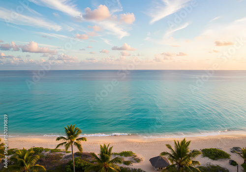 Fototapeta Naklejka Na Ścianę i Meble -  Serene Sunset Over a Caribbean Beach