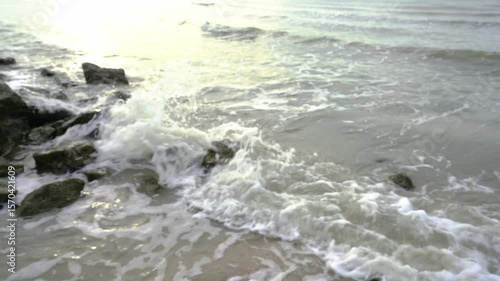 Powerful waves of the  Ocean. Waves and rocks of the  Ocean. Beautiful seascape, Ocean and waves crashing against a rocky cliff, with splashes.