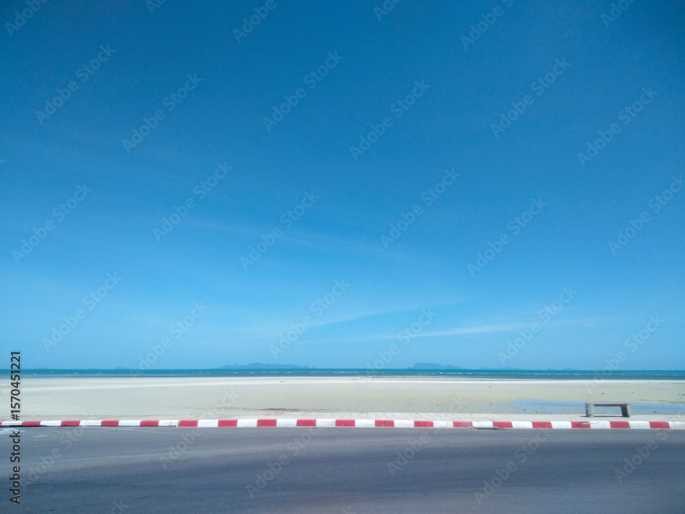 Fototapeta premium Asphalt Road Along Nathon Beach with Blue Sky and Cloud Background, Koh Samui, Thailand