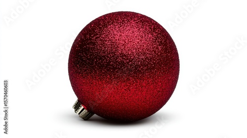 red christmas ball on white background. A vibrant sphere ornament against a pristine backdrop.