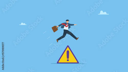 Smart businessman jumps over trouble sign in business crisis. Symbolizes avoid business trouble risk, smart thinking to overcome difficulty obstacle or emotional problem, solving problem.