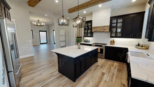 Wallpaper Mural A modern kitchen featuring black cabinets and wooden beams, bright and spacious. Torontodigital.ca