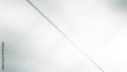 Abstract blue background with textured lines and a brushed metallic surface
