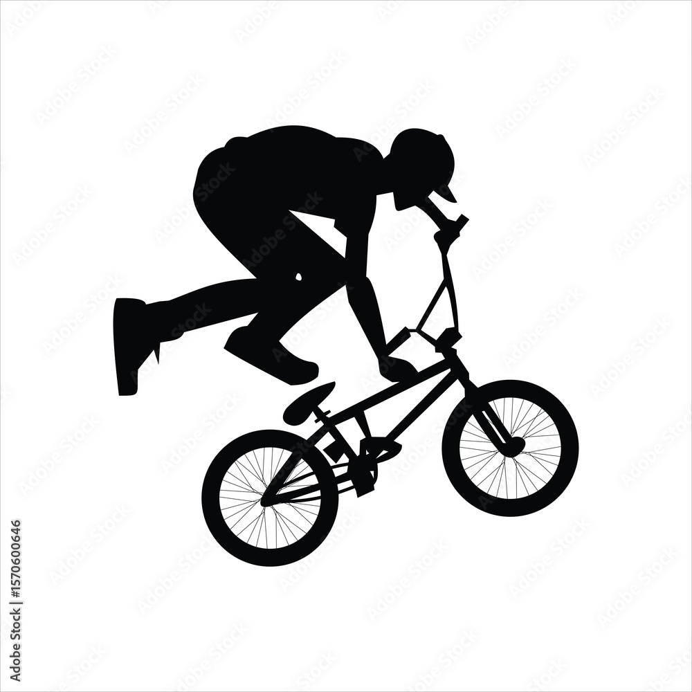 Fototapeta premium Black silhouette of a BMX rider performing an aerial stunt on a bicycle