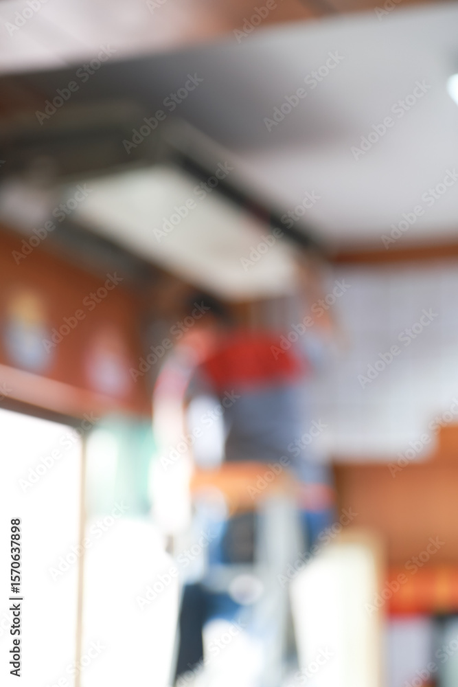 Obraz premium Abstract blurred an air conditioner cleaning in a room Background.