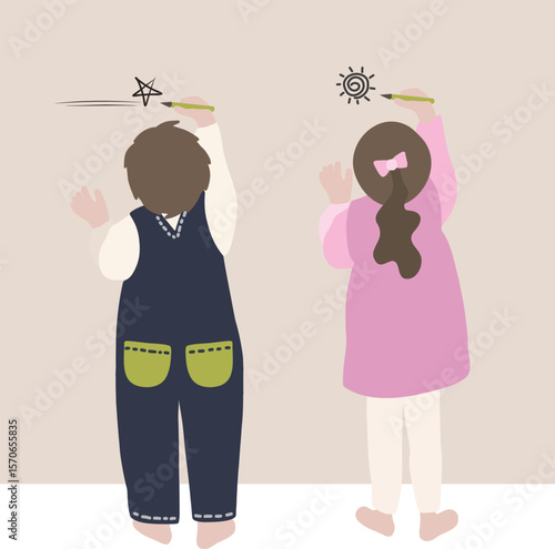 벽에 낙서하는 아이