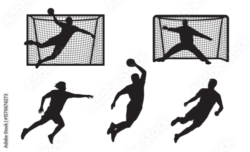 Silhouette of handball players in action near the goal during a match