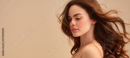 Wallpaper Mural The elegant model with flowing hair in a serene studio setting. Torontodigital.ca