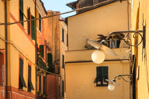an Italian seaside town Monterosso al Mare, Italy — a cozy narrow street with...