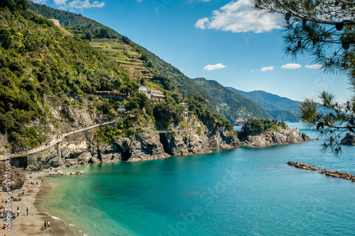 Canvas Print Monterosso al Mare, calm bay with crystal blue water and green terraces on the slopes