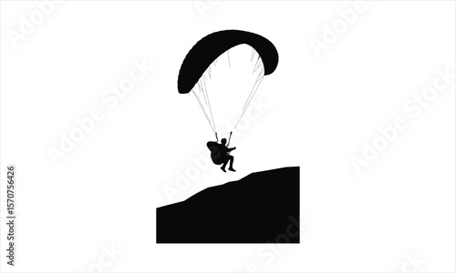Man soaring through sky with paraglider silhouette