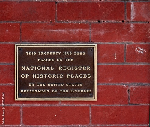 US Department of Interior plaque on a red brick wall