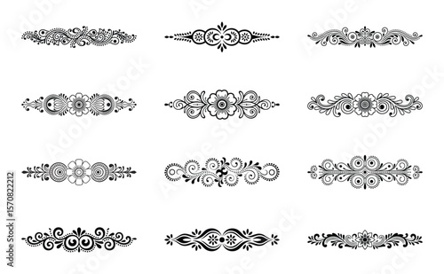Collection of decorative flourishes and borders with floral elements isolated on white background