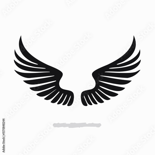 Black graceful wings span out, designed for logo concepts and creative design projects to add a touch of freedom.