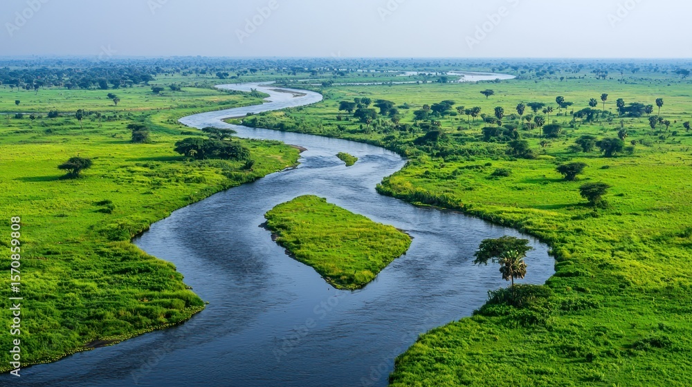 Curving river winds through a lush, green landscape Curving river winds through a lush, green landscape