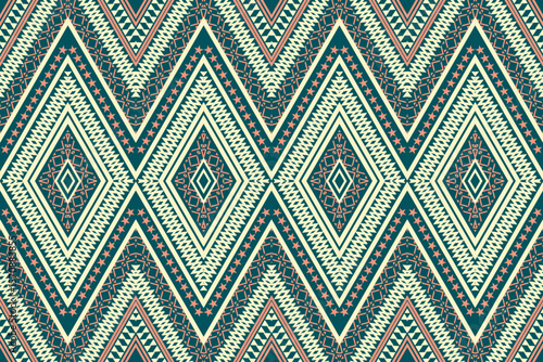 Seamless ethnic geometric pattern with traditional tribal elements, featuring diamond shapes and zigzag lines in earthy tones of beige, teal, and coral. Ideal for textile, wallpaper, and background 