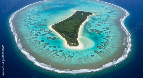 Aerial View of a Tropical Island Surrounded by Turquoise Waters and Reefs