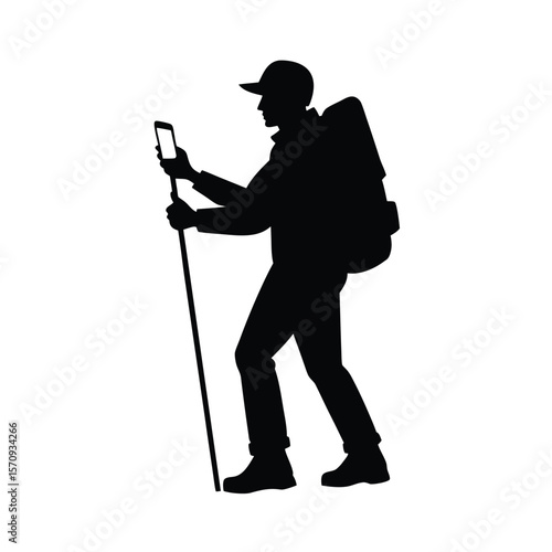 Black silhouette of a hiker with backpack and trekking pole using a smartphone
