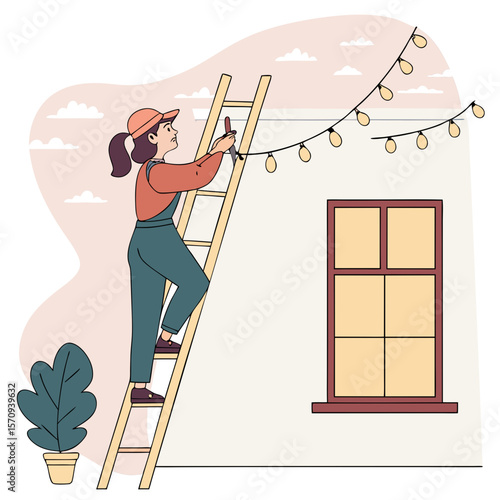 A woman on a ladder hanging string lights near a window with plant and clouds in the background outside