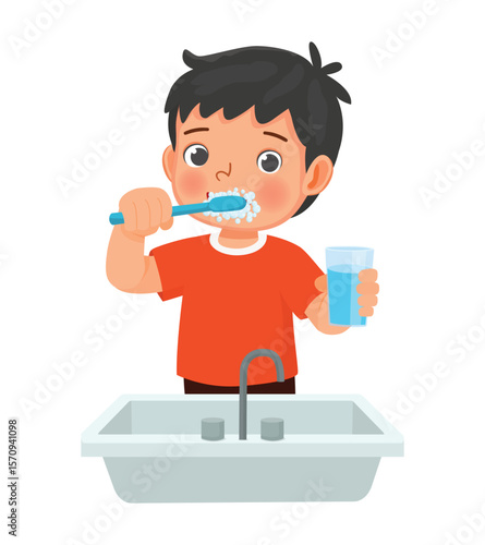 Little boy brushing teeth with tooth brush for dental care 
