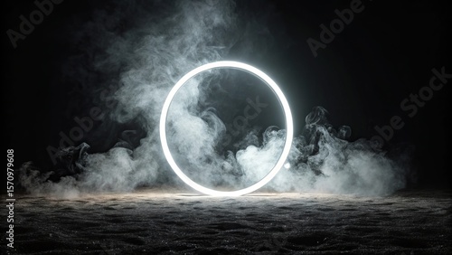 Glowing white ring illuminating wispy smoke on dark textured ground